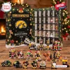 Front view of Iowa Hawkeyes 2026 Christmas Advent Calendar with holiday figurines displayed.