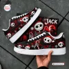 Side view of Jack Skellington Christmas Air Force 1 shoes with red snowflake prints.