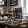 Front view of the Jake Bauers 2026 NLCS MVP Vinyl Figure standing beside its branded box.