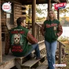 Lifestyle view of two people wearing Jason Voorhees Hockey Mask Horror Varsity Jackets on a cabin porch.