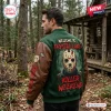 Back view of a person wearing the Jason Voorhees Hockey Mask Horror Varsity Jacket in a forest setting.