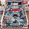 Front view of a Jaws Movie Personalized Blanket spread flat on a bed.