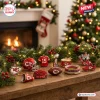 Front view of Kansas City Chiefs ornaments displayed on a wooden table with a Christmas tree and fireplace.