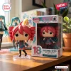Front view of Kasane Teto 18th Anniversary Vinyl Figure standing outside its branded box.