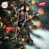 Front view of a KISS band member Christmas ornament hanging on a pine tree branch.