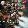 Front view of a KISS Band Members Christmas Ornament featuring a spiked rock figure holding a bass guitar on a tree.