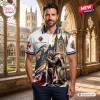 Front view of a man wearing the Knights of Columbus Crusader White Polo Shirt featuring a cathedral and knight graphic.