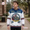 Man wearing Knights of Columbus white hoodie with blue and red details and knight crest.