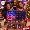 Two smiling girls opening the Kpop Star Guardians Advent Calendar 2026 featuring numbered compartments and miniature charms.