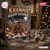 Front view of Krampus Advent Calendar 2026 box with figurines on table.