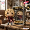 Front view of the Kurt Cobain Nirvana 40th Anniversary Vinyl Figure standing next to its illustrated box.