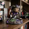 Front view of a Lamar Jackson Baltimore Ravens vinyl figurine posed running on a lighted stadium base.