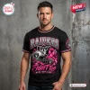 Front view of a man wearing a black Las Vegas Raiders breast cancer awareness shirt with pink graphics.