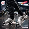 Side view of Las Vegas Raiders Custom Sport Air Max Plus Shoes worn outdoors at night.