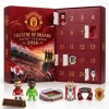 Open red Manchester United Old Trafford 2026 Advent Calendar with numbered doors and miniature figures.
