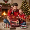 Father and son opening the Manchester United Red Devils Old Trafford 2026 Advent Calendar by a Christmas tree.