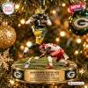 Action figurine ornament on a Christmas tree depicting a player leaping over a defender.
