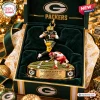 Front view of Marshawn Lloyd Green Bay Packers Christmas Ornament featuring a football player leaping.