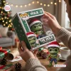 Close-up of hands holding the Marvel The Hulk Christmas Elf Vinyl Figure packaging in a festive living room.