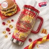 Angled view of the McDonald's 86th Anniversary YETI Handle Tumbler with red tie-dye background.