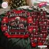 Front view of a red holiday sweater and jogger pants set featuring a skull graphic and band members.