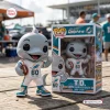 Front view of the Miami Dolphins TD Mascot 60th Anniversary Vinyl Figure standing beside its retail packaging.