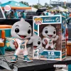 Front view of Miami Dolphins TD Mascot 60th Anniversary Vinyl Figure standing beside its retail packaging.