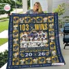 Lifestyle view of a smiling woman holding a Milwaukee Brewers 103 Wins Quilt Blanket outdoors.