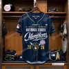 Front view of a blue Milwaukee Brewers 2026 National League Champions baseball jersey hanging in a locker room.
