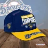 Side view of a blue and yellow cap featuring National League Champions text and team logos.