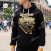 Front view of a black Milwaukee Brewers 2026 World Series Champions hoodie with gold lettering outside a stadium.