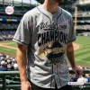 Front view of the grey Milwaukee Brewers 2026 World Series Champions baseball jersey worn at a stadium.