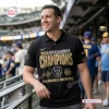 Man wearing Milwaukee Brewers 2026 World Series Champions Polo Shirt at a baseball stadium.