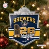 Close-up of a Milwaukee Brewers 2026 World Series Christmas Ornament hanging on a lit tree.