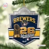 Front view of a Milwaukee Brewers 2026 World Series Christmas ornament hanging on a pine tree branch.