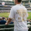 Back view of the Milwaukee Brewers 2026 World Series Gold Baseball Jersey worn in a stadium.
