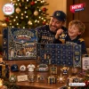 Father and son opening a Milwaukee Brewers Baseball Christmas Advent Calendar surrounded by ornaments.
