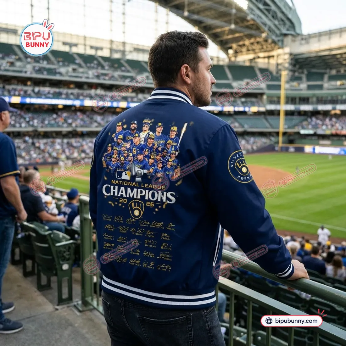 Rear view of the Milwaukee Brewers Champions Varsity Jacket inside the ballpark displaying the 2026 National League Champions roster graphic and gold signatures