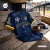 Front view of Milwaukee Brewers World Series Champions Baseball Jersey 2026 displayed on a dugout bench.