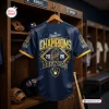 Back view of a blue Milwaukee Brewers World Series Champions Baseball Jersey 2026 hanging in a locker room.