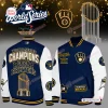 Front and back view of a blue and white Milwaukee Brewers World Series Champions varsity jacket with gold patches.