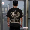 Back view of a person wearing a black World Series shirt featuring We Ruled October text and a trophy graphic.