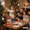 Family hanging Mini Cute Animals & Highland Cow Christmas Brick Ornament Advent Calendar 2026 on tree.