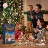 Family decorating a Christmas tree with brick ornaments next to the Mini Gingerbread Village & Winter Wonderland Brick Ornament Advent Calendar 2026.