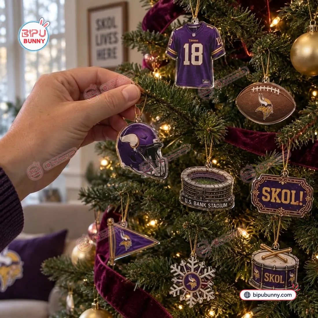 Hanging the contour-cut 2D acrylic Minnesota Vikings helmet, #18 jersey, U.S. Bank Stadium, SKOL plaque, and SKOL drum ornaments on a Christmas tree