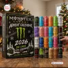 Front view of Monster Energy Drink Advent Calendar 2026 with twenty-four cans arranged next to the box.