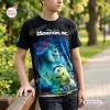 Front view of a person wearing a black Monsters Inc 25th Anniversary Black Shirt in an outdoor park setting.