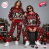 Front view of two models wearing Motley Crue Red Christmas Holiday Sweater and Jogger Set with festive holiday graphics.