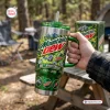 Close-up of Mountain Dew 86th Anniversary Stainless Steel Handle Tumbler held outdoors near a tent.