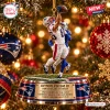 Close-up of a New England Patriots Efton Chism III Christmas Ornament hanging on a tree.